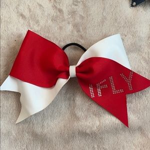 A cheerleading bow🎀